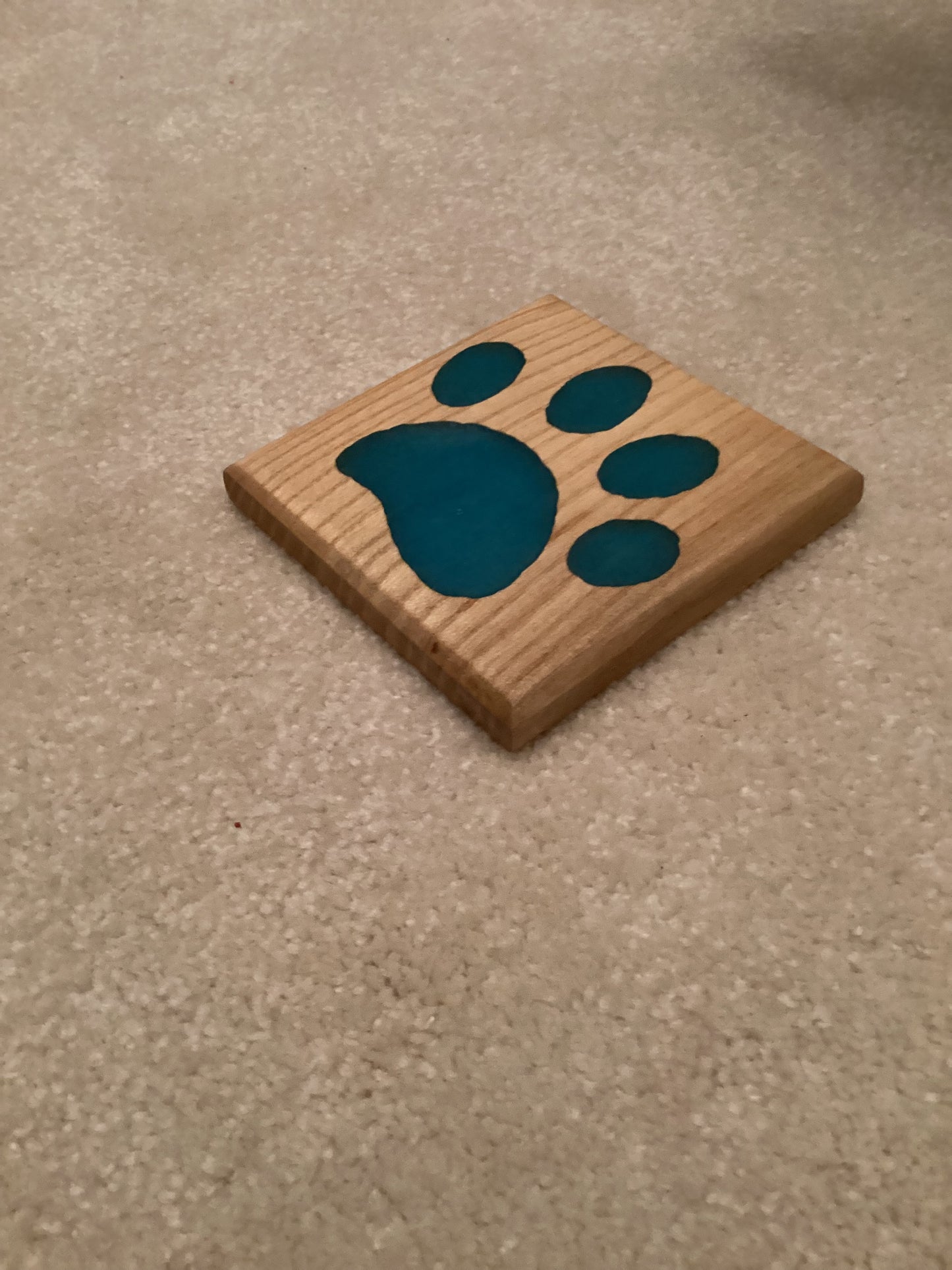 Paw print epoxy and wood coaster